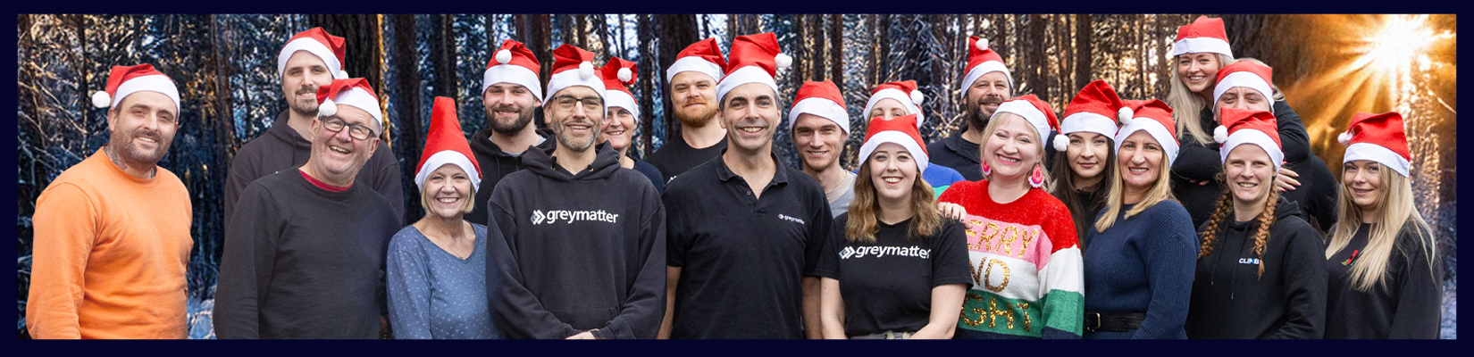 Christmas-opening-hours-Blog-Banner-graphic Banner image with a photo of the Grey Matter team